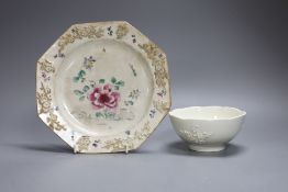 An 18th century Bow white glazed ‘prunus’ bowl, and a Bow octagonal plate, with floral design,