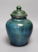 A Chinese mottle glazed terracotta jar and cover, 19th century,24 cms high,