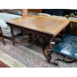 A late 19th / early 20th century French oak extending dining table, (one spare leaf) length 125cm,