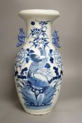 A large late 19th/early 20th century Chinese blue and white vase, 43cm tall