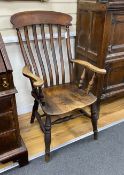 A Victorian elm and beech Windsor lathe back armchair, width 60cm, depth 46cm, height 109cm