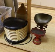 A 1930's HMV bakelite electric heater, A Mattocks cast iron weighing scale and a Lewes stoneware