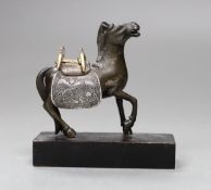A Chinese bronze mixed metal figure a saddled horse, late 19th/early 20th century, wood stand,8.5cms