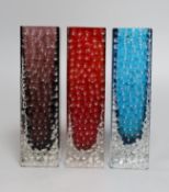 A trio of Whitefriars 'Nailhead' vases, designed by Geoffrey Baxter, kingfisher blue, red and