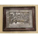 A framed embossed plaque, The Last Supper, silver plate on copper, 34.5 x 50cm excl frame