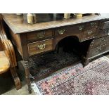 A Regency mahogany kneehole dressing table and a George III banded oak chest of three drawers, width