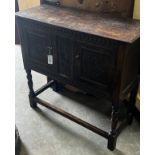 An 18th century style carved oak side cabinet, width 94cm depth 40cm height 88cm