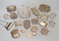 A stamped silver purse, together with eighteen metal chain mail purses and evening bags of various