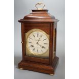 Knight and Gibbins. A reproduction mantel clock, 30c high