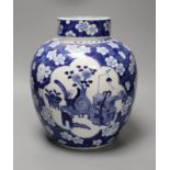 A large 19th century Chinese blue and white prunus jar and cover, 25cm