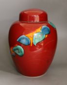 A large Poole Volcano design jar and cover, 32cm high