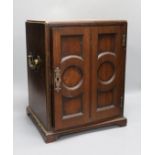 A 19th century mahogany coin collector’s cabinet, lacking trays. 39.5cm high, 32cm wide, 28cm deep