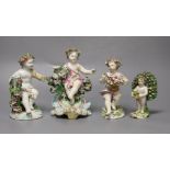 Three 18th century Derby porcelain putti (a.f) and another later continental putti, tallest 17cm