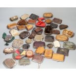 A collection of mostly Grand Tour, wooden souvenir purses and other 19th and 20th century leather
