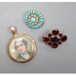 A Victorian yellow metal, turquoise and split pearl set circular brooch, 19mm, a similar garnet