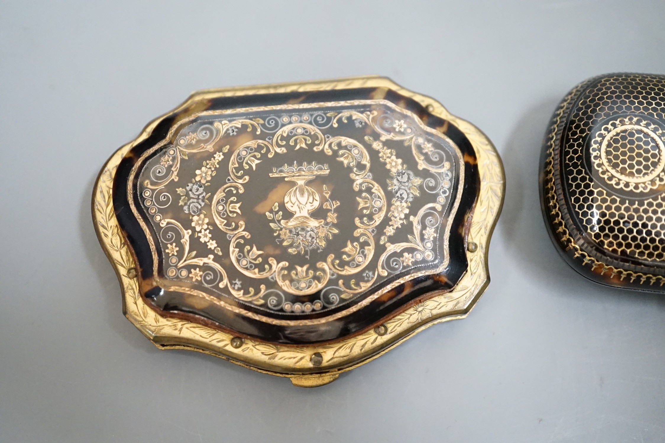 A 19th century finely worked tortoiseshell piqué work purse, with blue silk lining and a similar git - Image 2 of 5