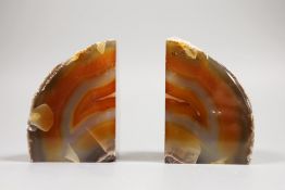 A pair of banded agate geode bookends, 10.5cm high