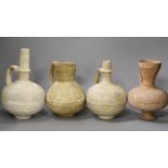 Four Islamic terracotta jugs, Middle Eastern possibly, 12th century, tallest 26cm