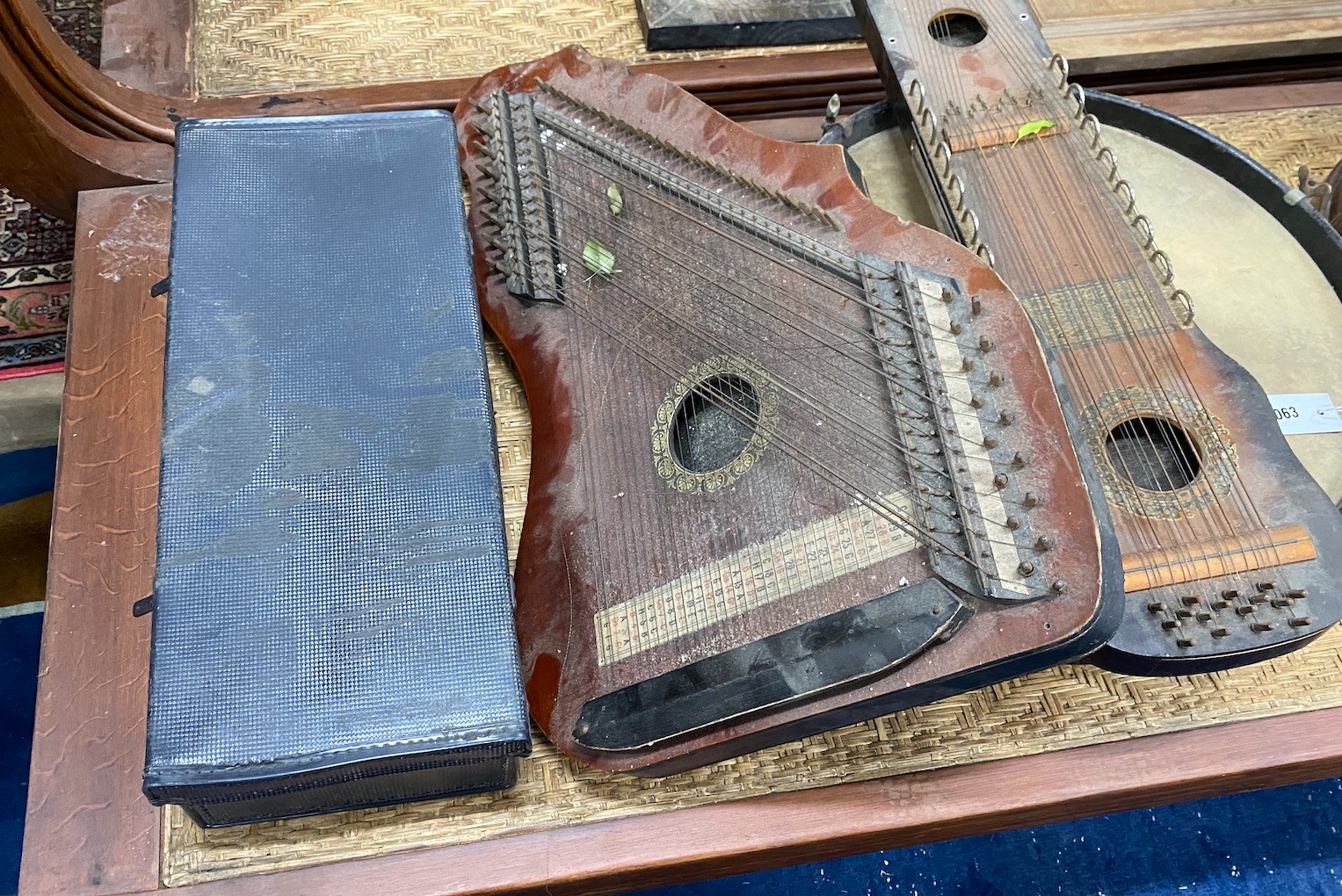 A group of assorted musical instruments comprising two large tambourines, two zithers and a Zenith - Image 2 of 3