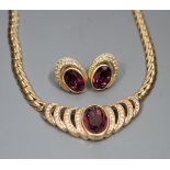 A Christian Dior gilt metal and two colour paste set costume necklace, 36cm and a pair of matching