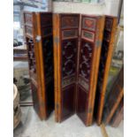 A Chinese painted carved and pierced wood seven fold screen, height 142cm