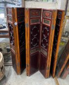 A Chinese painted carved and pierced wood seven fold screen, height 142cm
