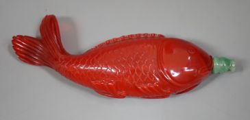 A Chinese moulded glass ‘fish’ snuff bottle, 11.5cm wide