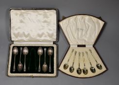 A cased set of six George V silver and enamel coffee spoons, Henry Clifford Davis, Birmingham, 1927,