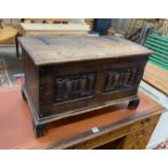 A small 1920's linenfold carved coffer, width 81cm