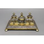 A late 19th century brass inkstand, 24cm wide