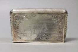 A 19th century Dutch 833 standard white metal tobacco box, engraved with a church in landscape