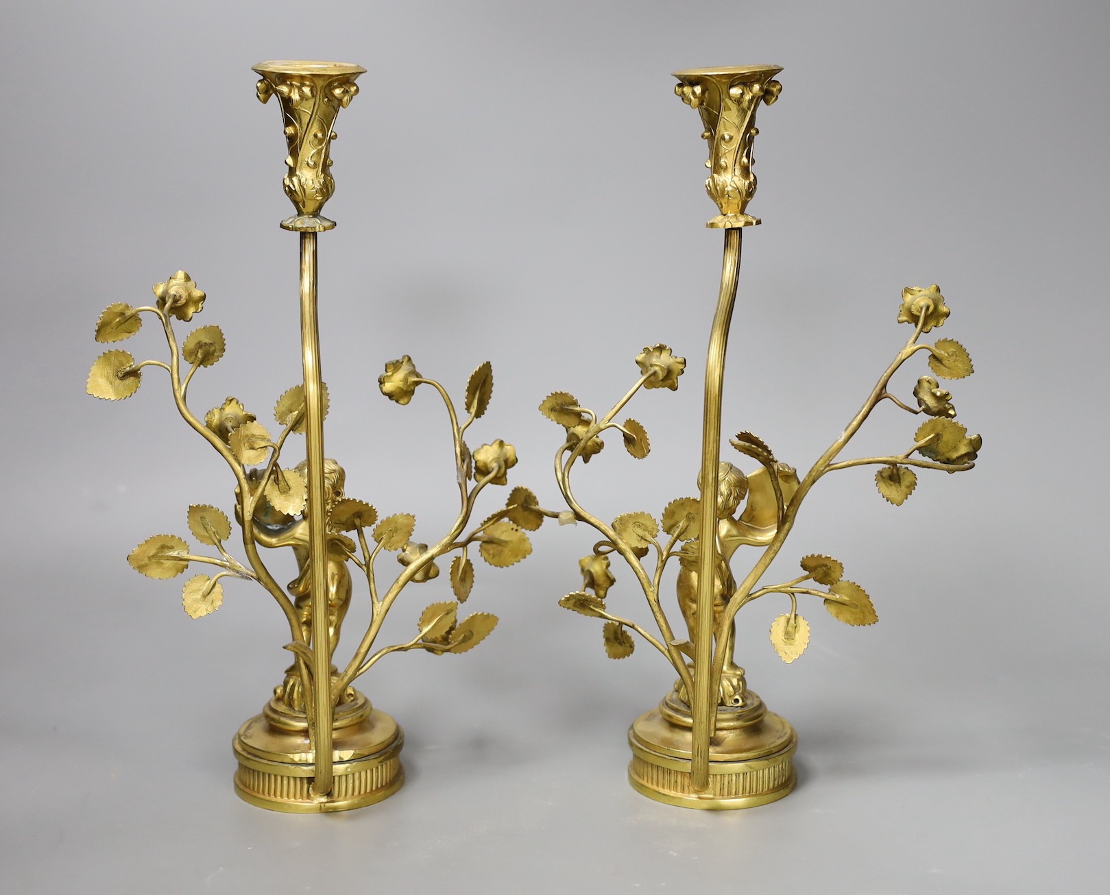 A pair of figural gilt metal candlesticks (Birmingham 1902 by Elkington & Company and Chester - Image 2 of 3