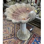 A reconstituted stone bird bath, width 55cm height 69cm