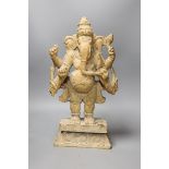 An Indian carved wood figure of Ganesha, 46cm tall