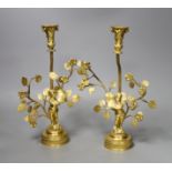 A pair of figural gilt metal candlesticks (Birmingham 1902 by Elkington & Company and Chester