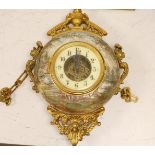 A late 19th century French ornate ceramic and gilt brass wall clock, 35cm tall