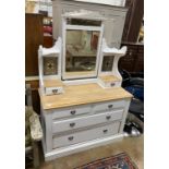 An Edwardian later painted beech dressing chest, with inset stained glass panels, width 116cm