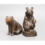 A Black Forest carved bear and a similar Japanese seated model of a bear, 15.5cm