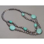 A single/double strand Tahitian? cultured pearl and turquoise necklace, 54cm.