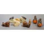 Two carved horn Buddhistic lions, four soapstone carvings and a pair of Chinese nickel and amber-