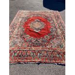 A large North West Persian red ground carpet, 361cm x 274cm