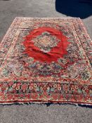 A large North West Persian red ground carpet, 361cm x 274cm