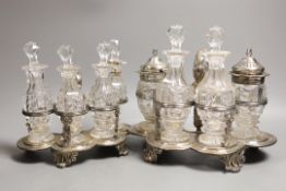 A graduated pair of William IV silver cruet stands, with ornate scroll handles, by John Fry II,