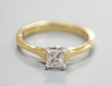 A modern 18ct gold and solitaire princess cut diamond set ring, size M, gross weight 3 grams,