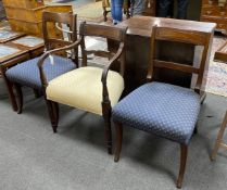 A late Sheraton mahogany elbow chair and a pair of Sheraton mahogany single chairs