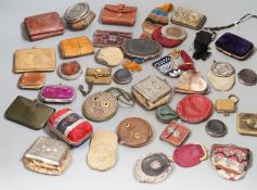 Mixed collection of mainly 19th century leather purses of various sizes and shapes, including two