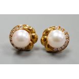 A modern pair of 18ct gold, cultured pearl and diamond chip set earrings, 12mm, gross weight 4.7