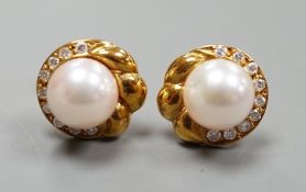 A modern pair of 18ct gold, cultured pearl and diamond chip set earrings, 12mm, gross weight 4.7
