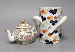 A Chinese Canton decorated famille rose teapot and a Japanese Fukugawa three handled vase (2),