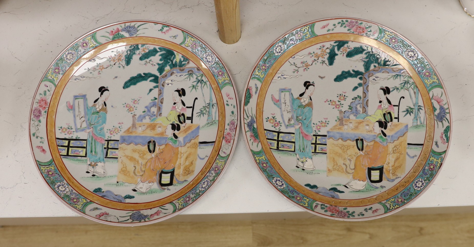 Two Japanese famille rose export chargers, 36.5cm diameter